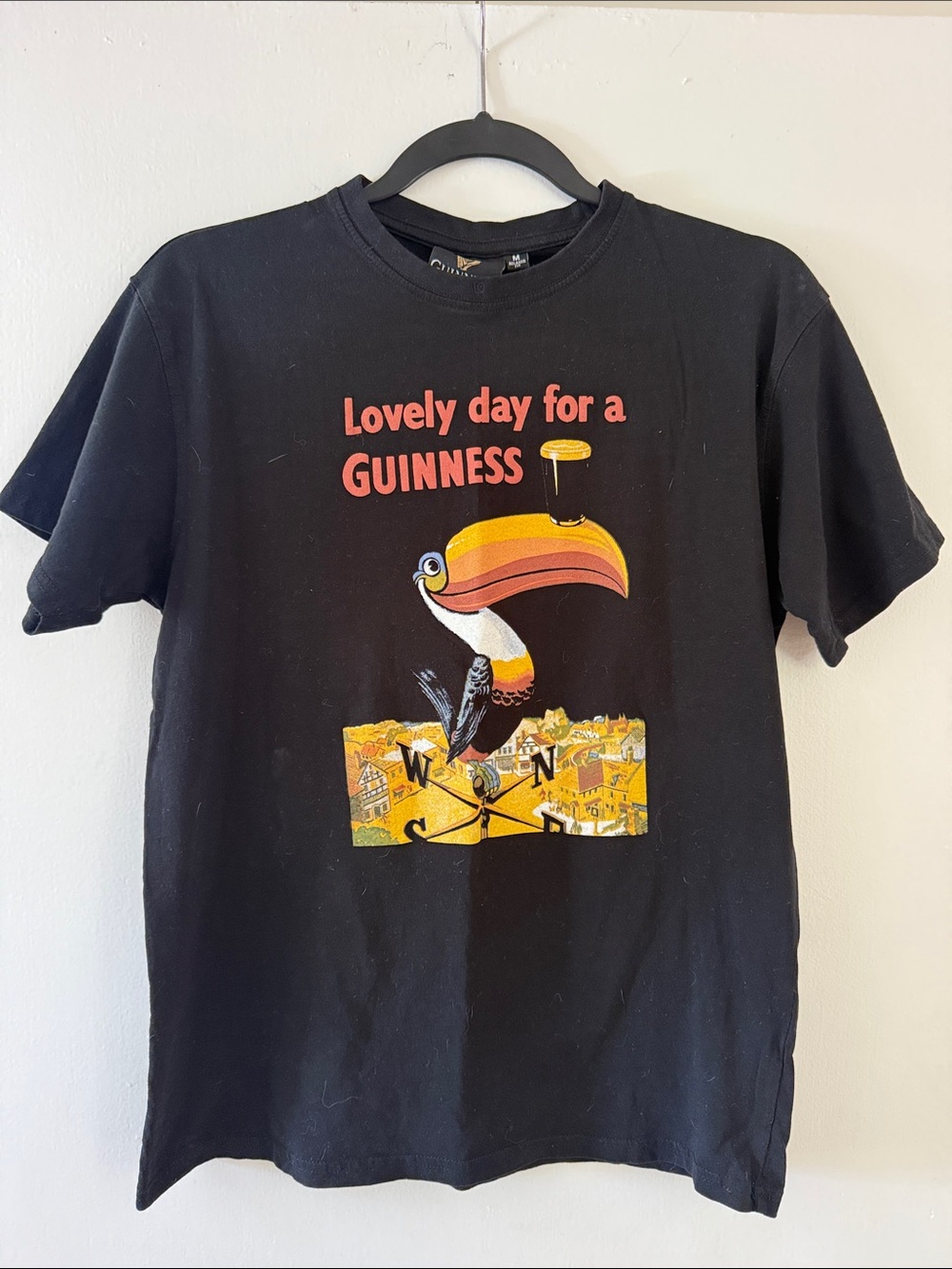 Guinness Black Tee with Colorful Toucan Graphic